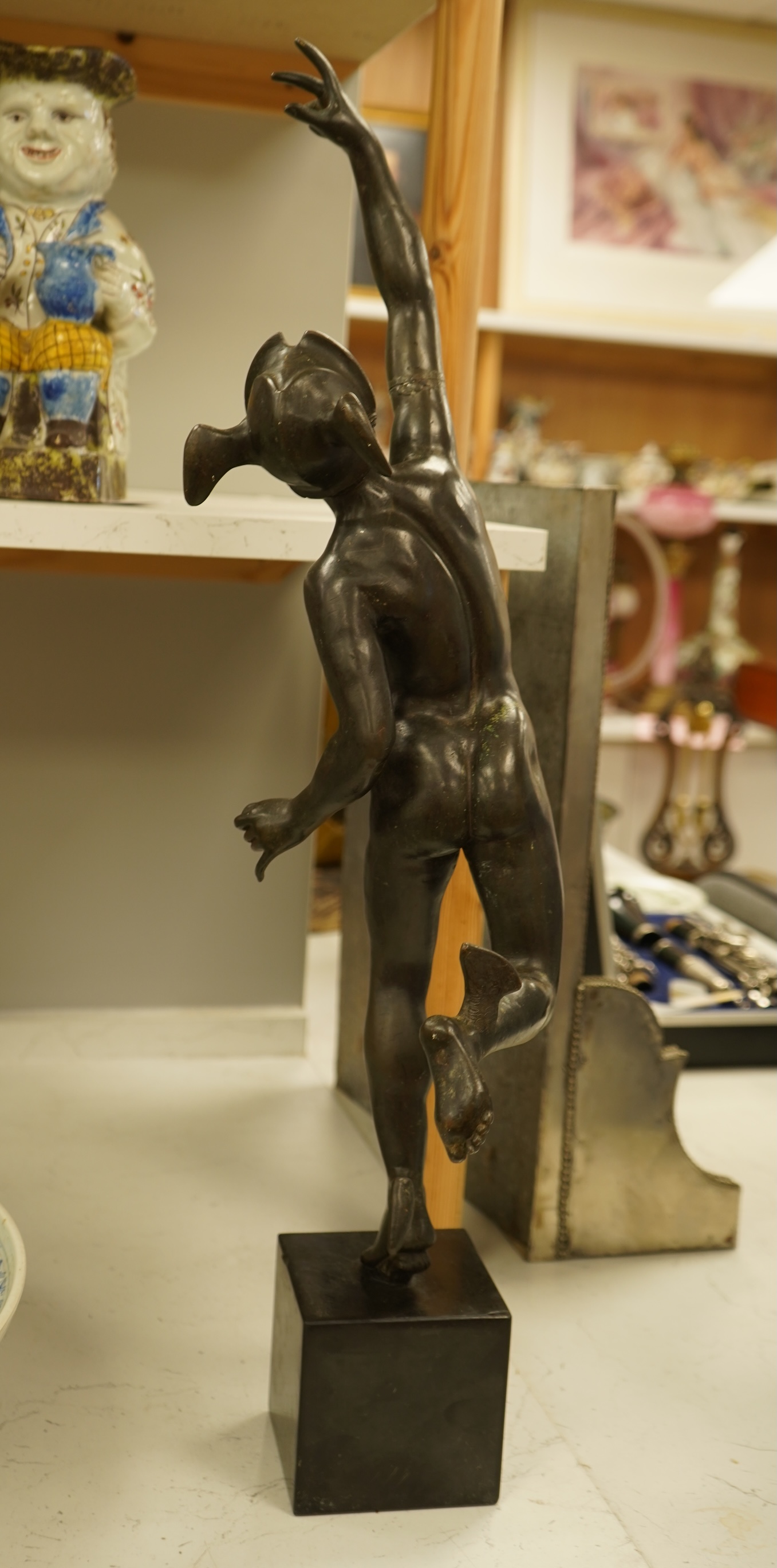 After the antique, a bronze study of Mercury raised on square base, 70cm high